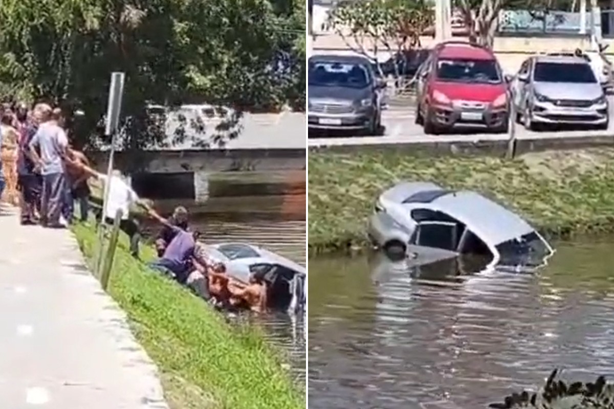 Pelo menos oito pessoas formam corrente e tiram motorista de carro que caiu em rio de Araruama